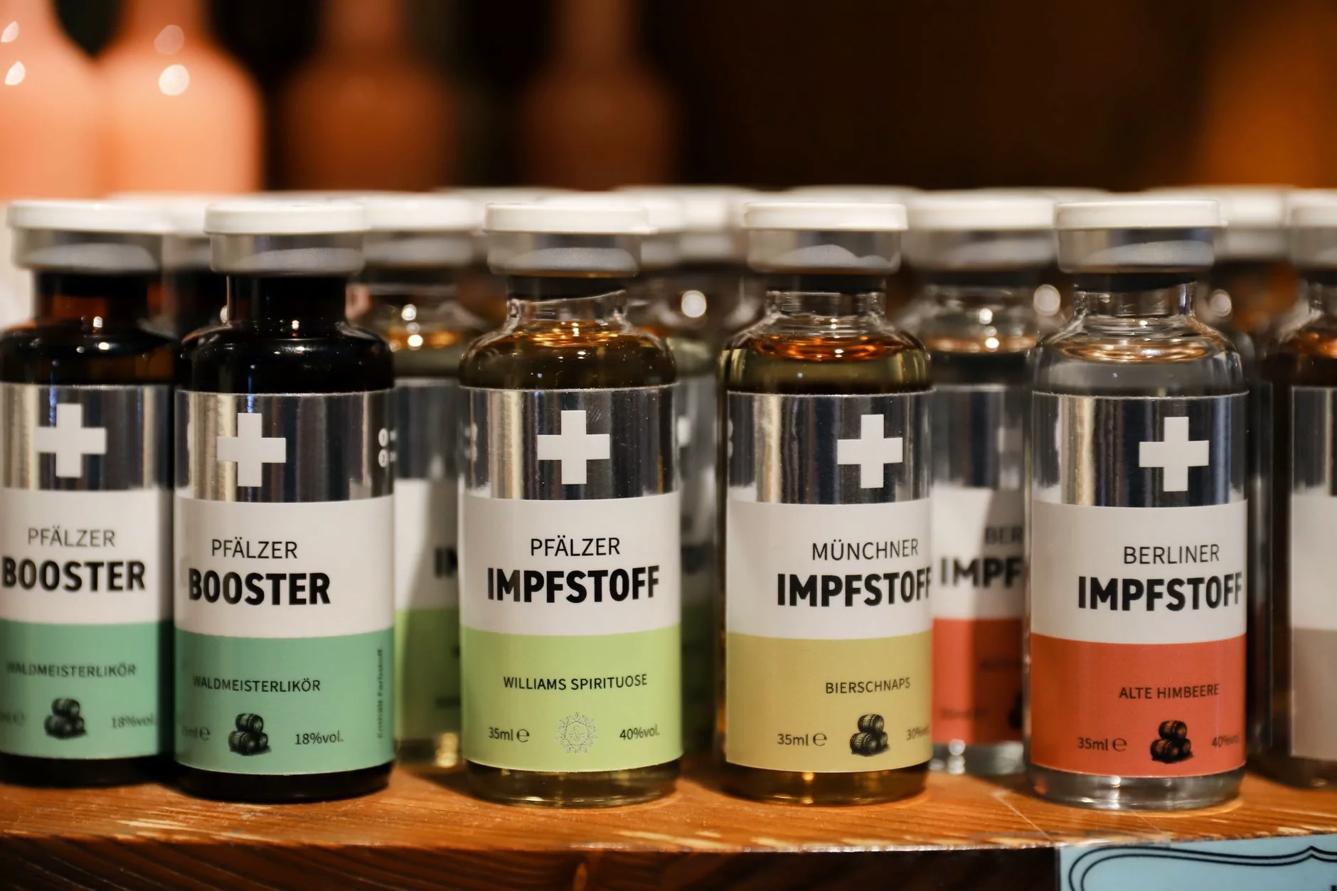 Rows of liqueur bottles displayed in the German Pharmacy Museum in Heidelberg.